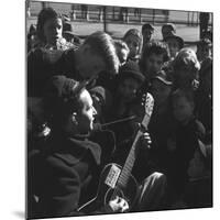 Folk Singer Woody Guthrie Playing Guitar for Group of Children-Eric Schaal-Mounted Premium Photographic Print