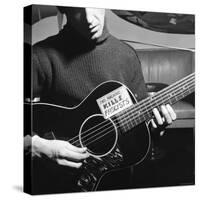 Folk Singer Woody Guthrie Playing Guitar with Sign on It Reading This Machine Kills Fascists-Eric Schaal-Stretched Canvas