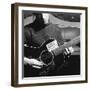 Folk Singer Woody Guthrie Playing Guitar with Sign on It Reading This Machine Kills Fascists-Eric Schaal-Framed Premium Photographic Print