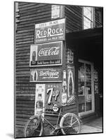 Food Store Called Leo's Place Covered with Beverage Ads Incl. Coca Cola, 7 Up, Dr. Pepper and Pepsi-Alfred Eisenstaedt-Mounted Photographic Print