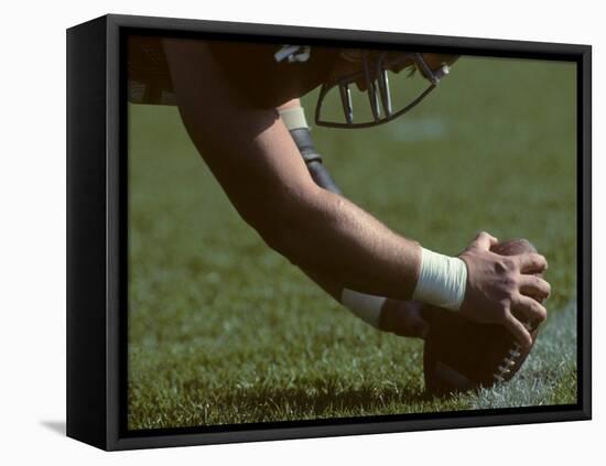 Football Center About to Snap the Ball-Paul Sutton-Framed Stretched Canvas