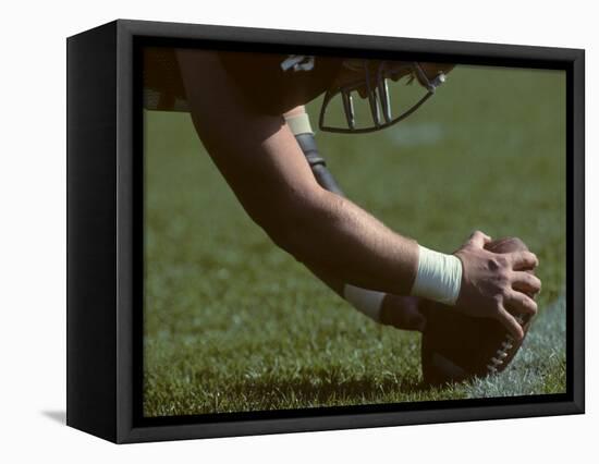 Football Center About to Snap the Ball-Paul Sutton-Framed Stretched Canvas