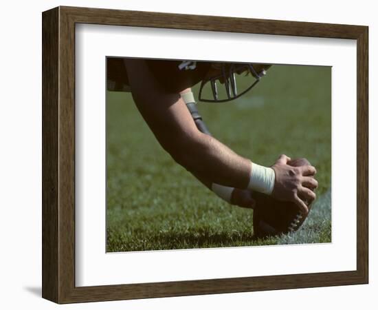 Football Center About to Snap the Ball-Paul Sutton-Framed Photographic Print