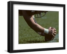 Football Center About to Snap the Ball-Paul Sutton-Framed Photographic Print