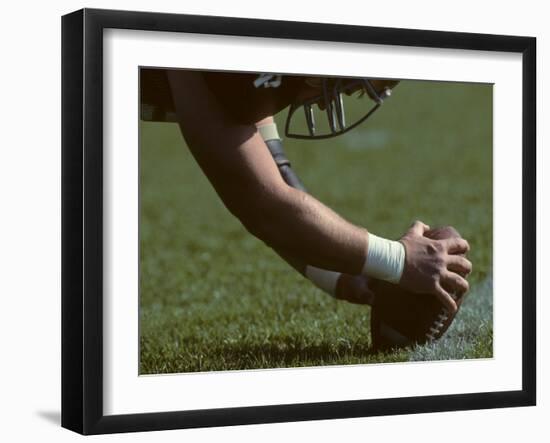 Football Center About to Snap the Ball-Paul Sutton-Framed Photographic Print