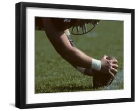 Football Center About to Snap the Ball-Paul Sutton-Framed Photographic Print