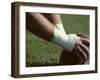 Football Center About to Snap the Ball-Paul Sutton-Framed Photographic Print