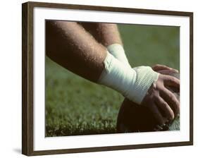 Football Center About to Snap the Ball-Paul Sutton-Framed Photographic Print