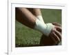 Football Center About to Snap the Ball-Paul Sutton-Framed Photographic Print