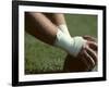 Football Center About to Snap the Ball-Paul Sutton-Framed Photographic Print