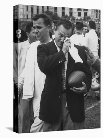 Football Coach Jack Freeman Holding Ball Weeps with Joy After His Team-Hank Walker-Stretched Canvas