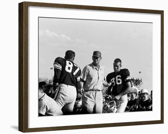 Football Coach Paul Bear Bryant of Texas A&M Talking W. Players During a Game-null-Framed Premium Photographic Print