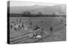 Football game at Manzanar Relocation Center, 1943-Ansel Adams-Stretched Canvas