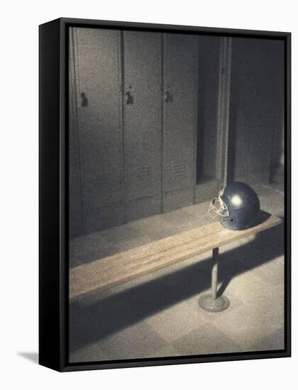 Football Helmet on Bench in Locker Room-null-Framed Stretched Canvas