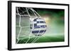 Football in Greece Colours at Back of Net against Football Pitch under Green Sky and Spotlights-Wavebreak Media Ltd-Framed Photographic Print