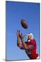 Football Player Catching a Football-DLILLC-Mounted Photographic Print