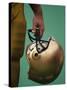 Football Player Holding His Helmet-Chris Trotman-Stretched Canvas