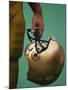 Football Player Holding His Helmet-Chris Trotman-Mounted Photographic Print