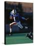 Football Player in Action-null-Stretched Canvas