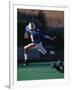 Football Player in Action-null-Framed Photographic Print