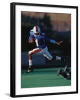 Football Player in Action-null-Framed Photographic Print