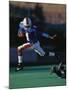 Football Player in Action-null-Mounted Photographic Print