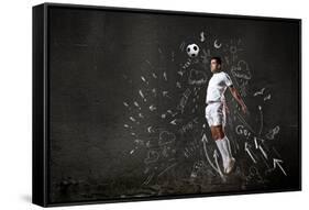 Football Player in Jump Striking Ball with Sketches at Backdrop-Sergey Nivens-Framed Stretched Canvas