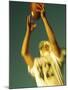 Football Player Reaching Up To Catch a Ball-null-Mounted Photographic Print