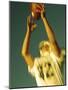 Football Player Reaching Up To Catch a Ball-null-Mounted Photographic Print