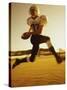 Football Player Running with The Ball-null-Stretched Canvas