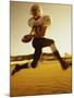 Football Player Running with The Ball-null-Mounted Premium Photographic Print