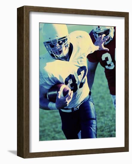 Football Player Running with The Ball-null-Framed Photographic Print