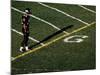 Football Player Standing at the Goal Line-null-Mounted Photographic Print