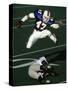 Football Running Back Flys over the Defense-null-Stretched Canvas