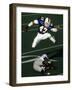 Football Running Back Flys over the Defense-null-Framed Photographic Print