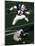 Football Running Back Flys over the Defense-null-Mounted Photographic Print