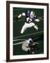 Football Running Back Flys over the Defense-null-Framed Photographic Print