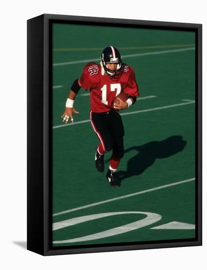 Football Running Back in Action-null-Framed Stretched Canvas