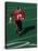 Football Running Back in Action-null-Stretched Canvas