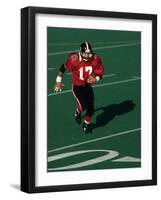 Football Running Back in Action-null-Framed Photographic Print