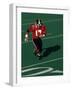 Football Running Back in Action-null-Framed Photographic Print