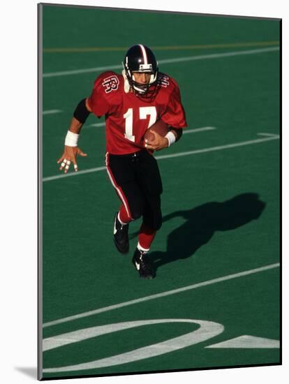 Football Running Back in Action-null-Mounted Photographic Print