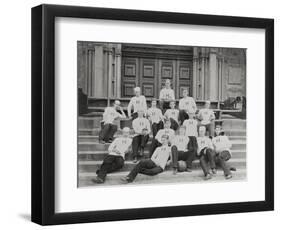 Football Team Relaxing-null-Framed Photographic Print