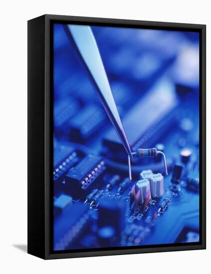 Forceps Holding a Resistor Over a Circuit Board-Chris Knapton-Framed Stretched Canvas