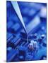 Forceps Holding a Resistor Over a Circuit Board-Chris Knapton-Mounted Premium Photographic Print