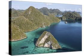 Forest-Covered Limestone Islands Surround a Lagoon in Raja Ampat-Stocktrek Images-Stretched Canvas