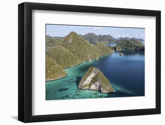 Forest-Covered Limestone Islands Surround a Lagoon in Raja Ampat-Stocktrek Images-Framed Photographic Print