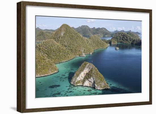 Forest-Covered Limestone Islands Surround a Lagoon in Raja Ampat-Stocktrek Images-Framed Photographic Print