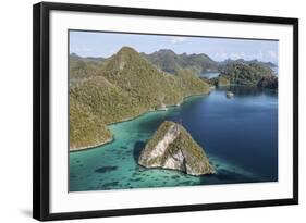 Forest-Covered Limestone Islands Surround a Lagoon in Raja Ampat-Stocktrek Images-Framed Photographic Print