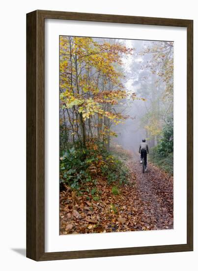 Forest cycling-Charles Bowman-Framed Photographic Print